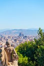 View of the city Barcelona from mountain Montjuic with a statue in the foreground. Royalty Free Stock Photo
