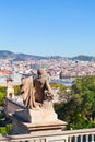 View of the city Barcelona from mountain Montjuic with a statue in the foreground. Royalty Free Stock Photo