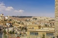 View of the city of Bethlehem from the hill, urban buildings, against the sky and clouds