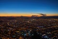 A view of the city of Bogota from the Monserrate hill at dusk, with a beautiful horizon with vibrant blue and orange colours Royalty Free Stock Photo