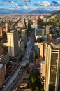 A view of the city of Bogota from the top of the Colpatria building, with big avenue surrounded by office buildings and view of Royalty Free Stock Photo