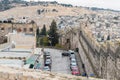 View from the city fortress wall to a part of the old town, and behind the wall is the Jewish Cemetery and the Arab village Silvan