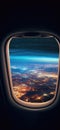 View Of City Lights From Plane Window On Night Flight Royalty Free Stock Photo