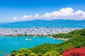 a view of the city from the Miyajima coastal beach.