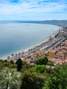 View of city of Nice coastline and beach with blue sky and cloudscape background, France Royalty Free Stock Photo