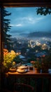 a view of a city at night from a balcony.Window view from closed window . Royalty Free Stock Photo