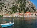 View of the city Omis, Croatia, with fishing boat in the foreground