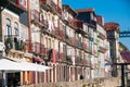 View of the city of Porto from the banks of the Douro river, facades, terraces and Port