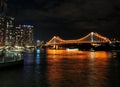 View From City Reach Boardwalk The Brightly Illuminated Story Bridge In Brisbane At Night Queensland Australia