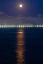 View of the city of Santos, Brazil, Brazil, with the full moon on the horizon Royalty Free Stock Photo