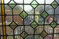 View of the city street through the old window