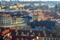 View of the city and city streets, architecture and roofs houses from above. Prague Royalty Free Stock Photo