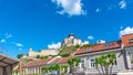 View of city Trencin, Slovakia. Beautiful town square with panoramic view to ancient Castle on the hill. Summer day with blue sky Royalty Free Stock Photo