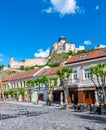View of city Trencin, Slovakia. Beautiful town square with panoramic view to ancient Castle on the hill. Summer day with blue sky Royalty Free Stock Photo