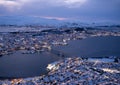 View of the city of Tromso in Norway during wintertime in the late evening hours Royalty Free Stock Photo