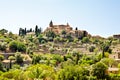 View on city Valldemossa with traditional flower decoration, famous old mediterranean village of Majorca. Balearic Royalty Free Stock Photo