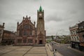 View from the city wall of Derry or Londonderry, place with cannons, overlooking towards the city square with Guildhall and peace