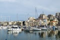 View of the city and yachts and ships in the port of Heraklion