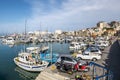 View of the city and yachts and ships in the port of Heraklion