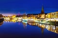 View of the cityscape of Bremen, Germany at night. Illuminated landmarks