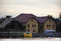 View cityscape Udonthani city and landscape and yellow duck rubber doll in pond dusk time for thai people travel visit relax at of