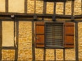 Cityscape of wood and bricks facade in Figeac France