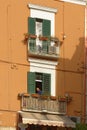 Classic apartment exterior with wrought-iron balconies