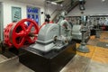 View of a classic 1934 industrial hydroelectric generator, inside an exhibition hall at the Electricity Museum