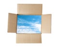 View of clear blue sky through open cardboard packaging Royalty Free Stock Photo