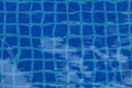 View of the clear water in the pool with blue ceramic tiles Royalty Free Stock Photo
