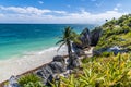 A view from the cliff top over an isolated beach at the Mayan settlement of Tulum, Mexico Royalty Free Stock Photo