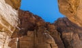 A view of the cliffs adjacent to the Treasury building in the ancient city of Petra, Jordan Royalty Free Stock Photo