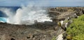 View of cliffs and blowhole in La Espanola island Royalty Free Stock Photo