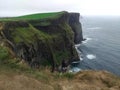 View of the Cliffs of Moher in summer. Cliff in Ireland, on the Atlantic Ocean in County Clare. Royalty Free Stock Photo
