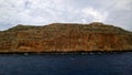 View of the cliffs from the ship sailing to the island of Gramvousa and the Bay of Balos Royalty Free Stock Photo