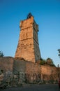 View of the clock tower made of stone and with a bell in Draguignan. Royalty Free Stock Photo