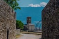 View of clock tower and stone walls at Castle complex Gjirokaster, Albania