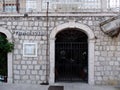 View of the closed entrance arch of the tavern Bora in Podgora