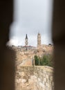 View through the closed loophole in the city fortress wall at the Tower of David near the Jaffa Gate in old city of Jerusalem, Isr Royalty Free Stock Photo