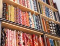 Cloth rolls on store shelves Royalty Free Stock Photo