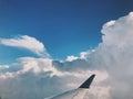 View of clouds from airplane seat