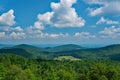 View of Clouds, Field and the Blue Ridge Mountains Royalty Free Stock Photo