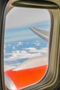 View of clouds and sky. aircraft wing from the window, tinted photo Royalty Free Stock Photo