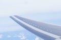 View of clouds and sky. aircraft wing from the window, tinted photo Royalty Free Stock Photo