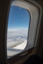 View of clouds, sky and airplane engine from aeroplane window Royalty Free Stock Photo