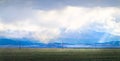 View of cloudy peaks of Tavan-Bogdo-Ula mountain ridge Royalty Free Stock Photo