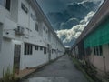 View cloudy sky at the backlane of the housing area Royalty Free Stock Photo