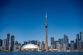 View of the CN Tower and Rogers Center in Downtown Toronto from Toronto Center Island. Royalty Free Stock Photo