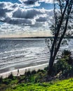 View of the coast of Atlantida in Canelones Uruguay with a cloudy sky Royalty Free Stock Photo