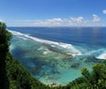 View of the coast with beach and coral at bukit in bali Royalty Free Stock Photo